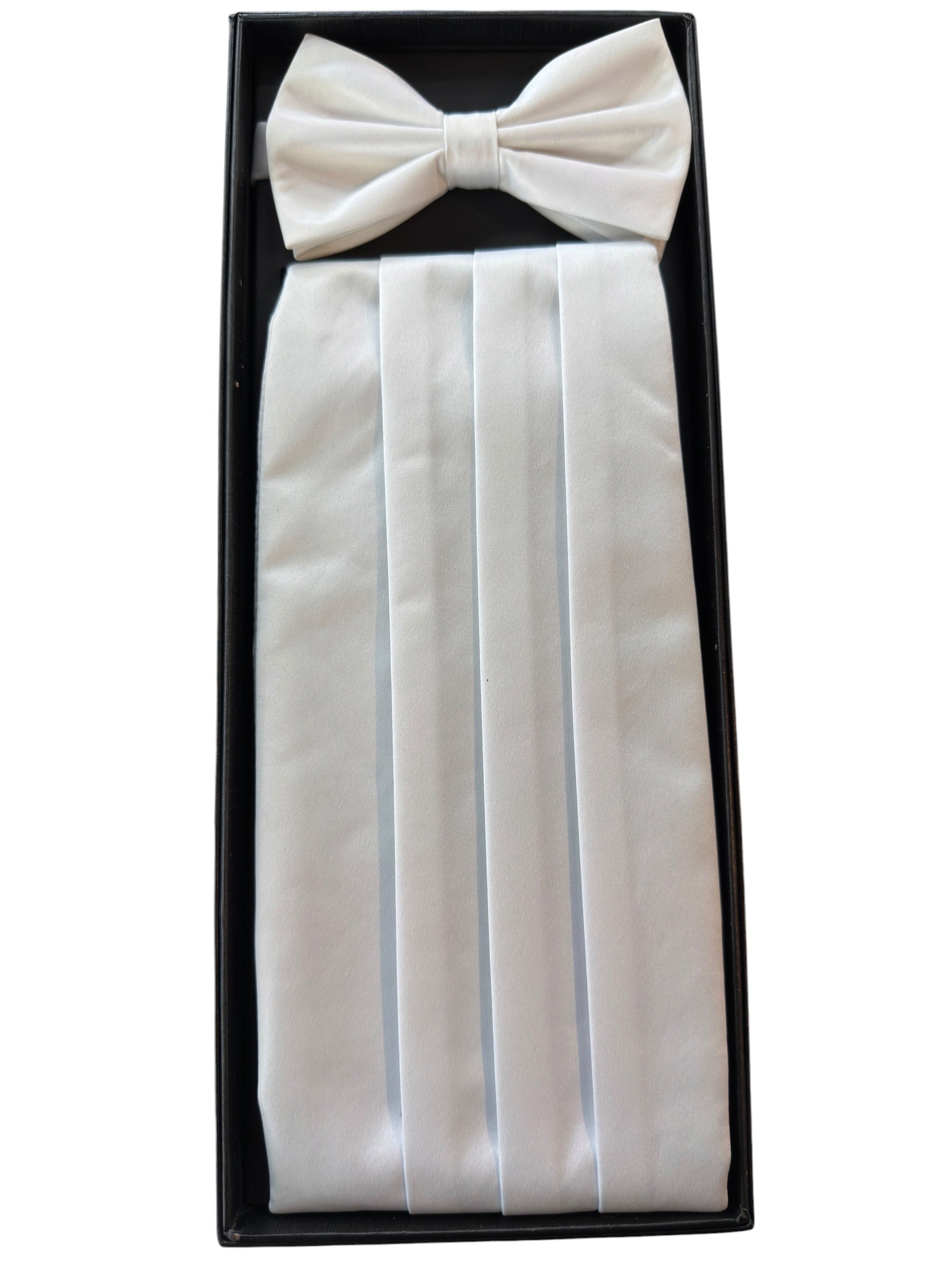 A White pleated formal cummerbund set with a matching bow tie, presented in a black gift box against a white background.