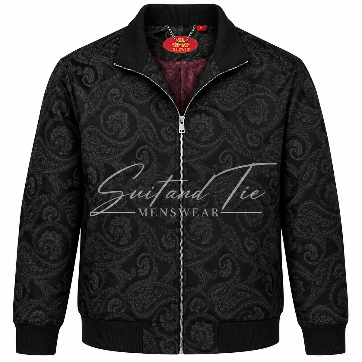 A black zip-up jacket with a subtle black paisley pattern, featuring a silver zipper, ribbed collar, cuffs, and hem, with a white 'Guit and Tie MENSWEAR' logo printed across the chest.