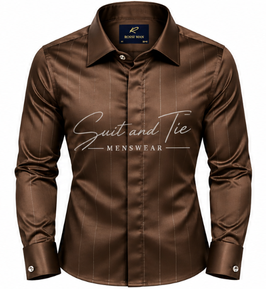 A men's long-sleeve button-up dress shirt in a rich chocolate brown satin-like fabric with subtle vertical pinstripes. The shirt features a classic collar, buttoned cuffs, and a prominent white script logo overlay reading 'Suit and Tie MENSWEAR' across the chest.