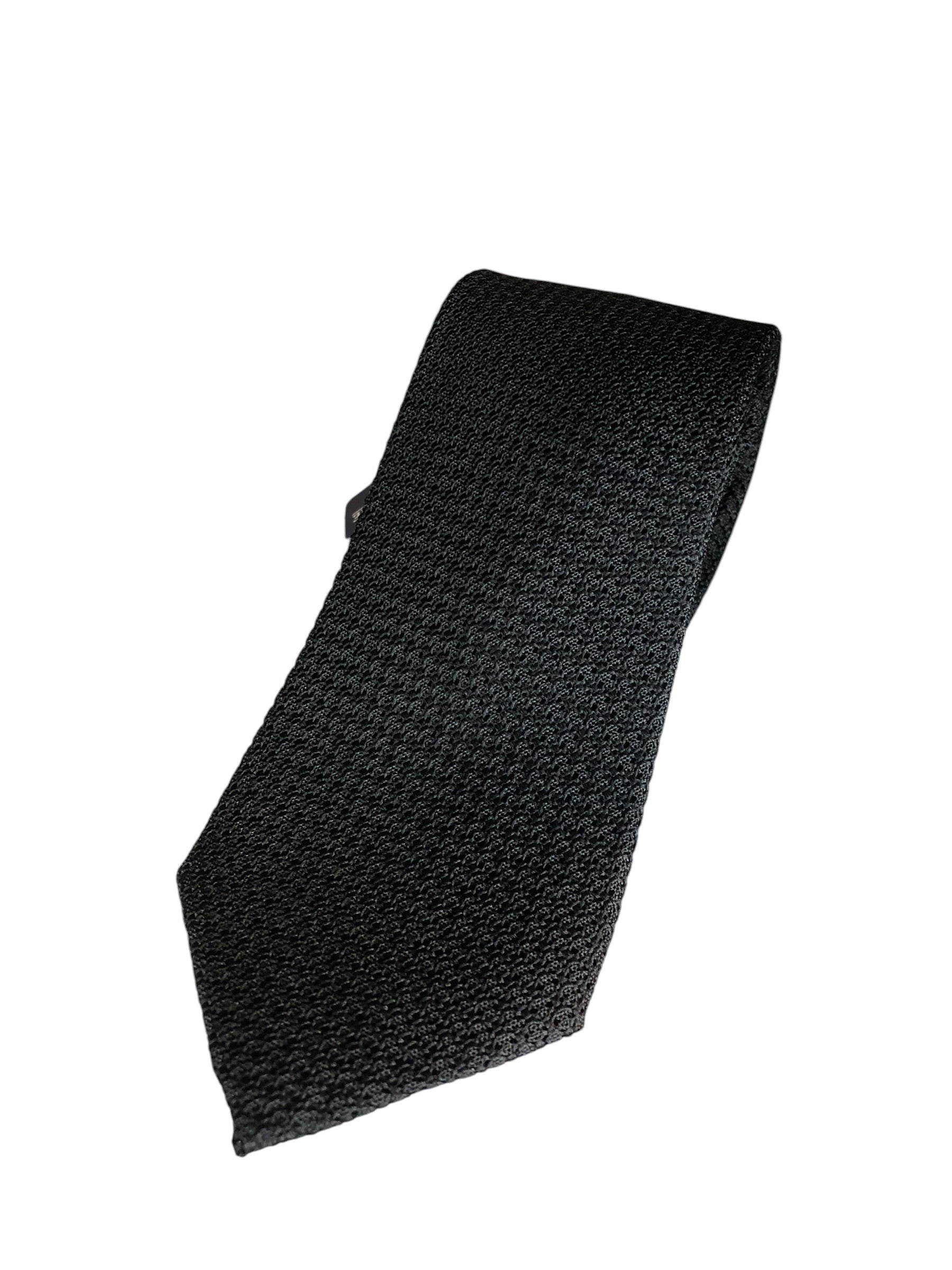 A black textured knit necktie, folded diagonally on a plain white background.