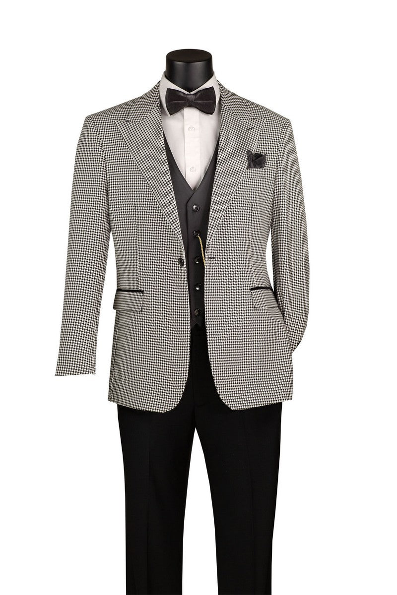 A men's formal suit displayed on a black mannequin torso against a plain white background. The outfit includes a light gray and black houndstooth blazer, a black vest, black trousers, a white dress shirt, a black bow tie, and a black pocket square.