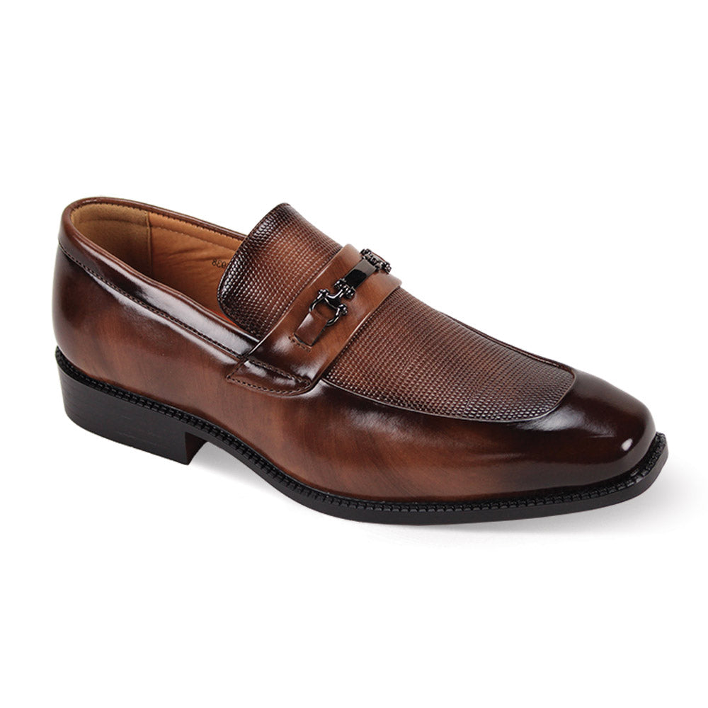 Brown loafer shoe on a white background