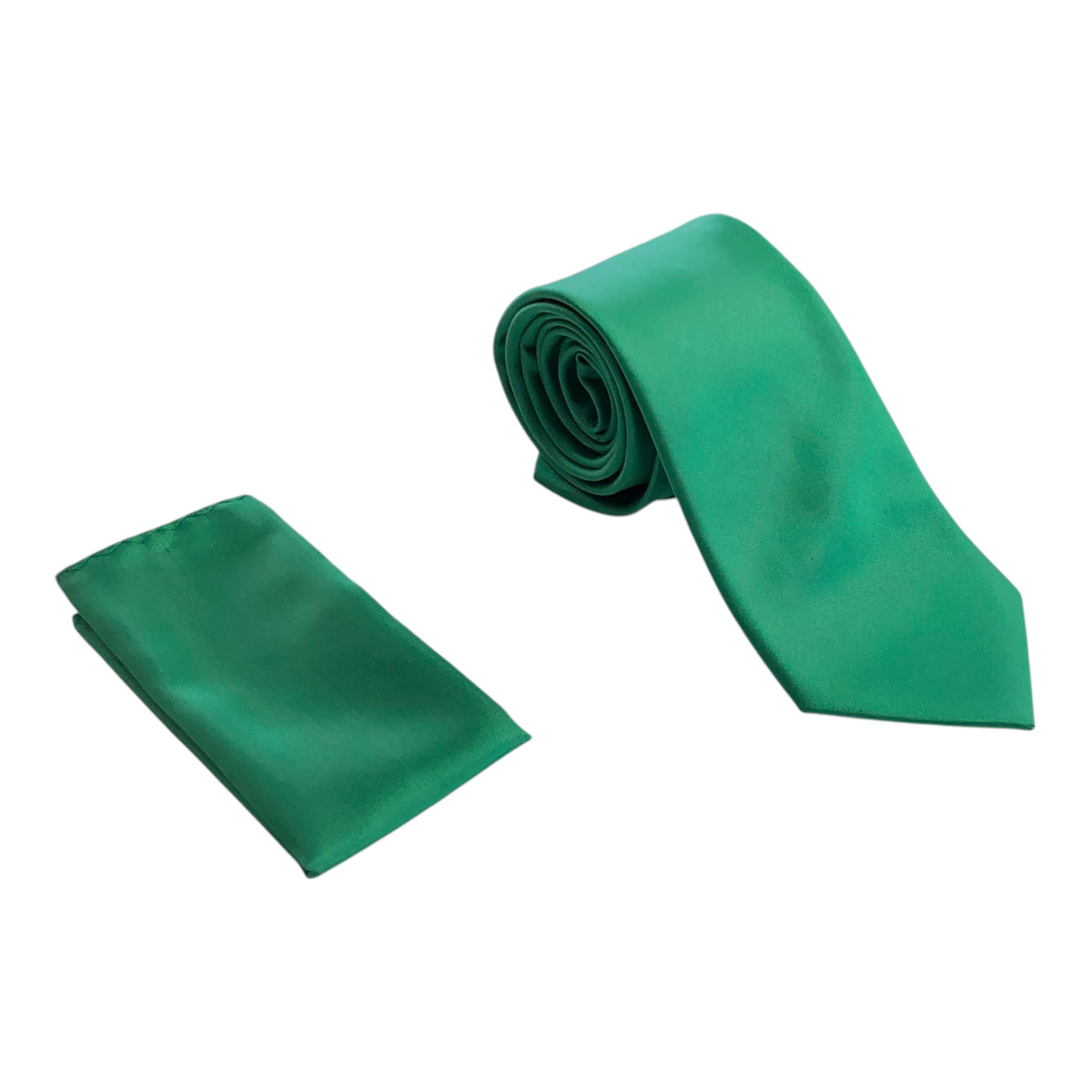 A matching green necktie and pocket square set, with the tie rolled and the pocket square folded, on a plain white background.