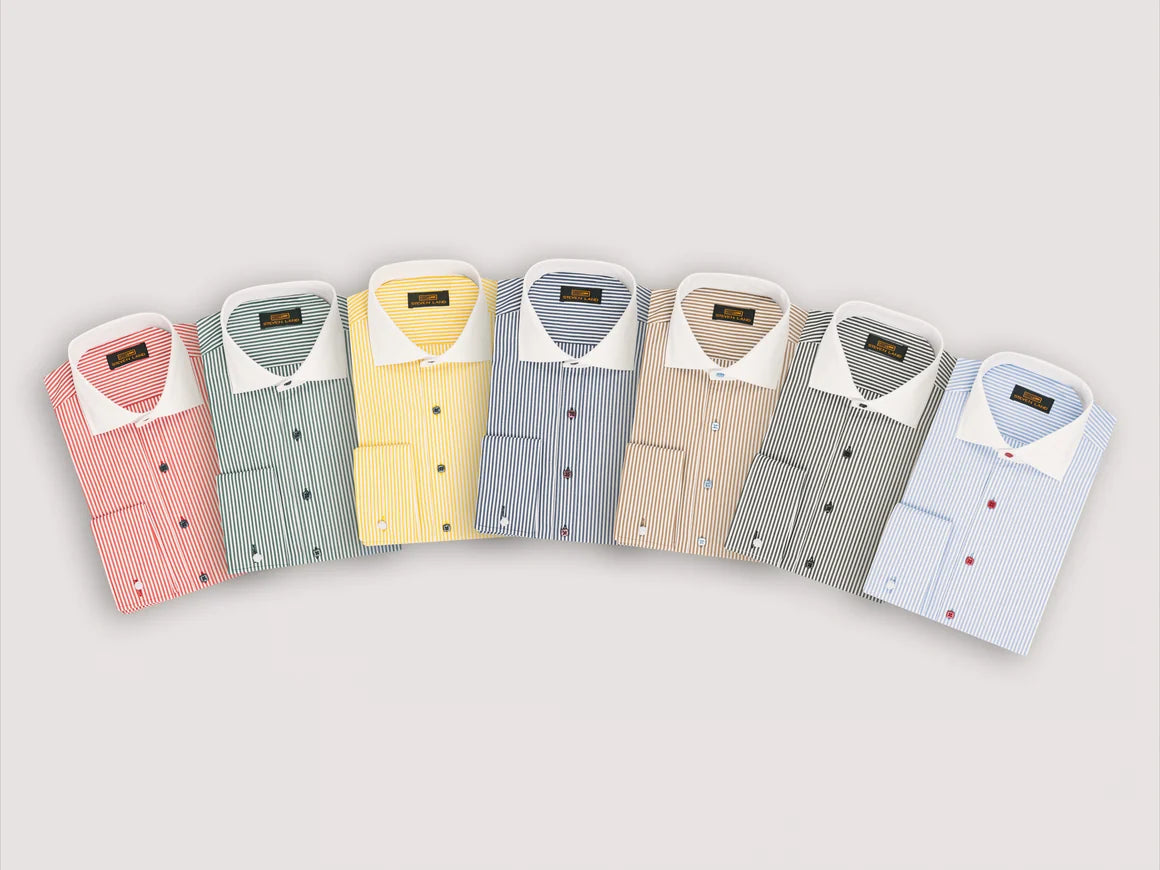 Seven men's dress shirts in different colors and stripe patterns, arranged in a fan shape on a light gray background.